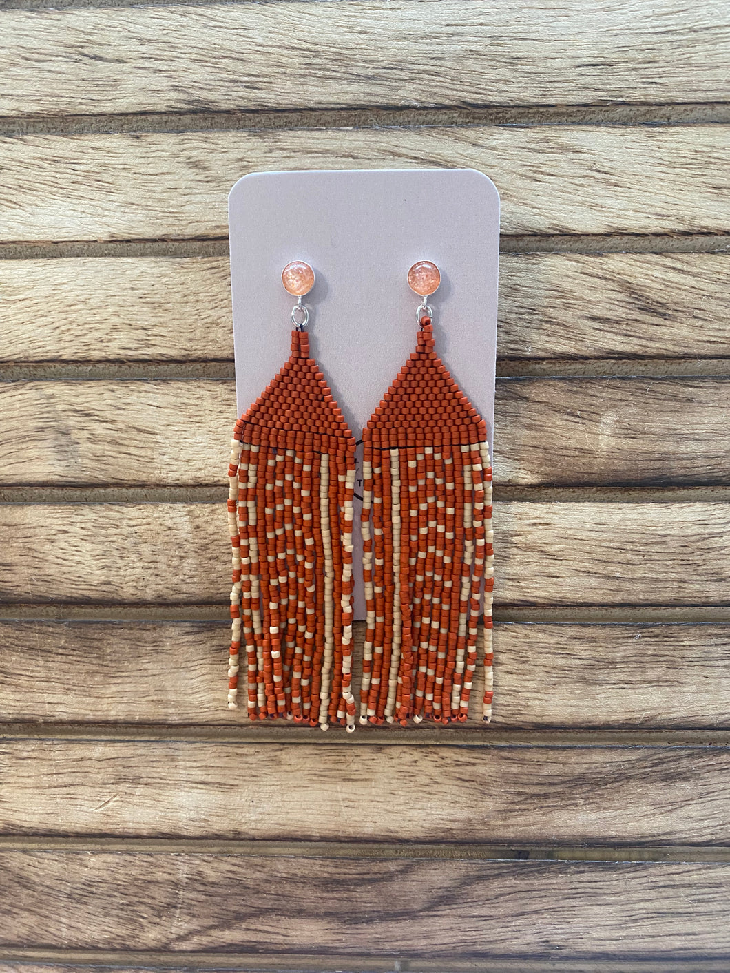 Orange beaded fringe earrings